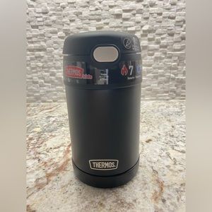 Brand new thermos with spoon